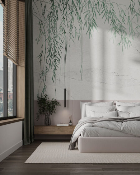 Fototapeta do sypialni z delikatnymi zielonymi gałęziami i liśćmi na betonowej ścianie